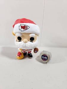 lot 160 image: Funko Pop Kansas City Chiefs Santa Claus Figure And Replica Toy Ring