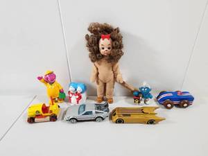 lot 169 image: Mixed Toy Collection with Classic Characters and Die-Cast Cars