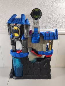 lot 203 image: Imaginext DC Super Friends Wayne Manor Batcave Playset