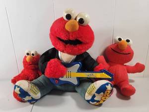 lot 206 image: Sesame Street Elmo Rock Star Band Guitar Plush Toy Set Vintage