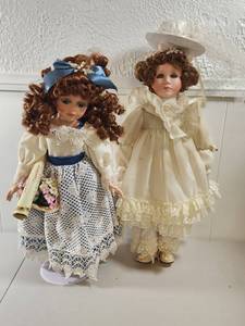 lot 264 image: Porcelain Dolls with Victorian Style Dresses Set of 2