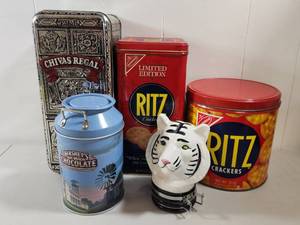 lot 316 image: Collection of Brand Promotional Tin Containers and White Tiger Cannister