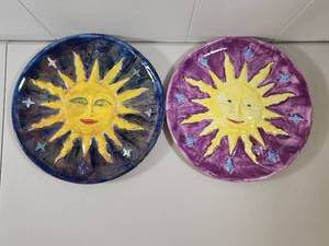 lot 320 image: Hand Painted Sun Face Ceramic Plates Set