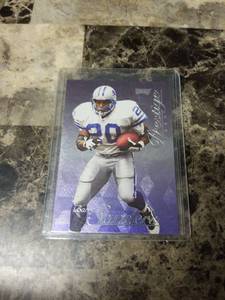 lot 711 image: 1998 Playoff Prestige Barry Sanders Detroit Lions Football Card