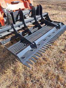lot 2824 image: Unused Wolverine Skid Steer Land Leveler  LL-12-78W