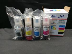 lot 4010 image: Couleuris Refill Ink Bottles 4 Bottles Black, Cyan, Magenta, Yellow - Retail $15