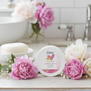 lot 4032 image: 2 pack Dove Nourishing Body Care, Face, Hand, and Body Beauty Cream for Normal to Dry Skin Lotion for Women with 24-Hour Moisturization, 2.53 Oz Each Jar - Retail $8