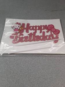 lot 219 image: Hello Kitty Birthday Cake Topper - Retail $0