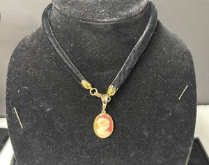 lot 226 image: Gold Tone Cameo Pendant Necklace with Black Chain