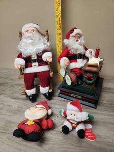 lot 414 image: Christmas Santa Claus Holiday Decoration Figurine Collection including one musical box Santa