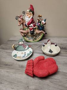 lot 417 image: Santa on Reindeer Figurine and 3 Ceramic Holiday Trinket  Snack bowls including one shaped like a mitten