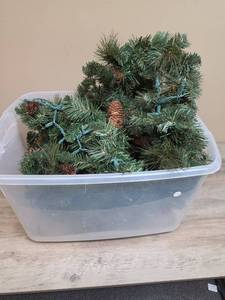 lot 483 image: Tub of garland with lights and pinecones