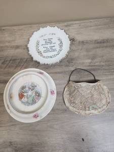 lot 553 image: Two decorative plates and a stone hangable vase with etched leaf motif