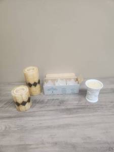 lot 591 image: PartyLite Frosted Lotus Blossom Votive Candle Holder Set, two pillar tea light holders with diamond patterns, and one candle