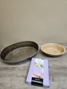 lot 596 image: Decorative Metal Serving Tray with Ornate Border Design, a Pottery Bowl with basket weave pattern and a purple Peva plastic tablecloth