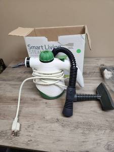 lot 610 image: Smart Living Steam Jr. Hand Steam Cleaner with attachments