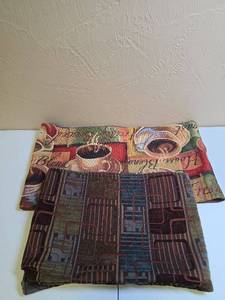 lot 634 image: Two 70 inch long table runners - one has square geometric pattern the other is Coffee Themed