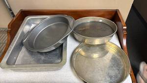 lot 764 image: Professional Aluminum Bakeware Set with Round Cake Pans and Rectangular Baking Sheets