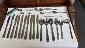 lot 769 image: Stainless Steel Flatware Set with Decorative Pattern