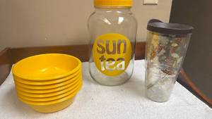 lot 832 image: Yellow Melamine Dinnerware Set with Sun Tea Jar and Tervis Dragonfly Tumbler