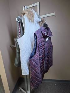 lot 1153 image: Three Womens size 2x vests,  two of them have hoods including one from Cavalini