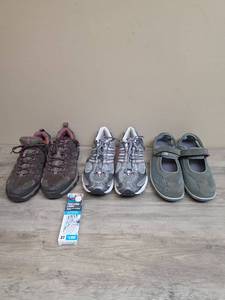 lot 1158 image: 3 pairs womens Sz 11 shoes including a pair of Merrell hiking shoes. And one pair of fast lock laces