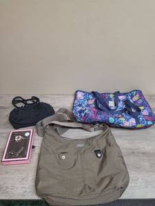 lot 1169 image: Womens handbags and totebags including one baggallini and a new handbag hangar. See last picture for addtl bag added to lot