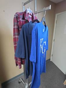 lot 1182 image: The mens size XL shirts including a brand new KC Royals tshirt and new Dockers polo style shirt