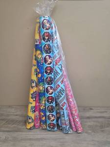 lot 396 image: Bag of birthday wrapping paper - mostly kids themed