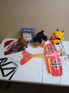 lot 1311 image: Kite, plush, Pirates of the Caribbean bandana and, Wood Brain Bender toy set.