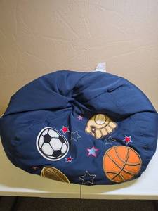lot 1312 image: Sports Themed Bean Bag Chair (could use some new beans)