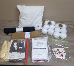 lot 1324 image: Mixed Craft Supply Bundle with Fabric, Foam Balls, and Sewing Kit