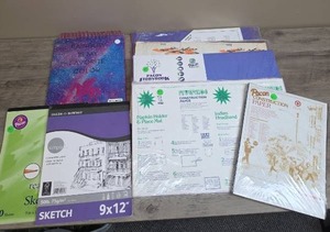 lot 1333 image: 3 sketchbooks and 5 packages of construction paper