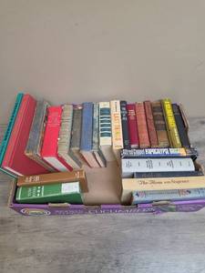 lot 1379 image: Large box of vintage books including Charles Dickens, Tom Jones and The Moon and the Sixpence
