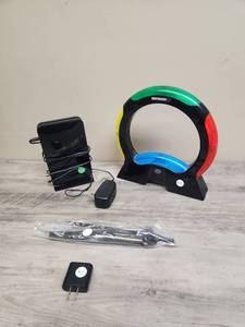 lot 1421 image: Simon Air Electronic Memory Game with Netgear CM500 Cable Modem Bundle