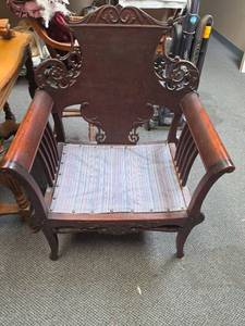 lot 11 image: Antique Wood Arm Chair. Just need a little TLC and a new pad. Solid and sturdy structure 25.5W x 20D x 35H. Seat height 13.5H