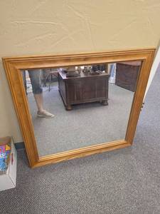 lot 28 image: Large Wood Framed Rectangular Wall Mirror. Has wire on back for hanging. Very heavy.   35W x 33H  Good condition