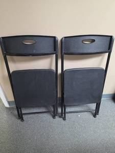 lot 32 image: Black Plastic Folding Chairs Set of 2 - very good conditon