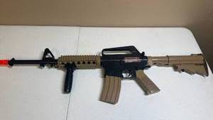 lot 1611 image: Airsoft Electric Rifle with Magazine and Accessories
