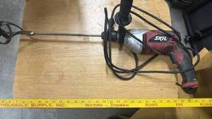 lot 1710 image: Skil Corded Electric Hammer Drill with Cable