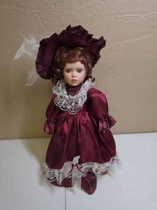 lot 281 image: Victorian Style Porcelain Doll with Burgundy Dress and Bonnet