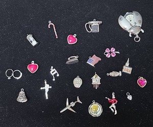 lot 257 image: Mixed silver Tone Charm Collection