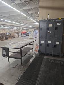 lot 70012 image: 8ft table with Gray Steel Lockers