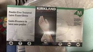 lot 51845 image: Kirkland Signature Powder-Free Textured Latex Exam Gloves - Retail $15