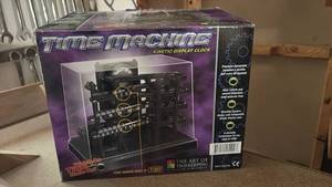 lot 51864 image: Time Machine Kinetic Display Clock - Retail $45