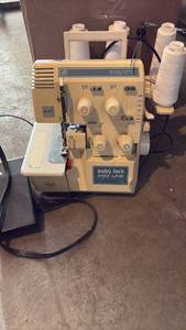 lot 51907 image: Baby Lock Pro Line 432 Thread Differential Feed Serger with Thread - Retail $200