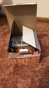lot 51952 image: Box of Preformed Penny Wrappers 48 Count - Retail $8