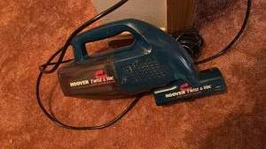 lot 51995 image: Hoover Twist and Vac Handheld Vacuum Cleaner - Retail $25