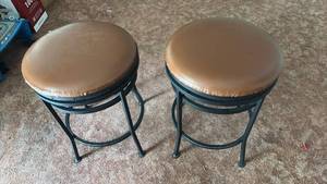lot 52013 image: Pair of Swivel Metal Frame Bar Stools with Brown Cushioned Seats - Retail $45