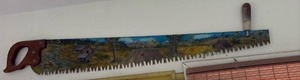 lot 52031 image: Hand Painted Crosscut Saw with Rural Landscape Scene - Retail $45